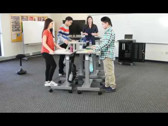 Luxor Sit and Stand Student Desk - Pneumatic^ Stand-Up Student Desks